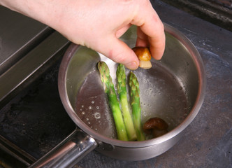 Chef preparing asparagus