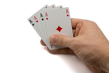 hand with four aces,isolated on white background