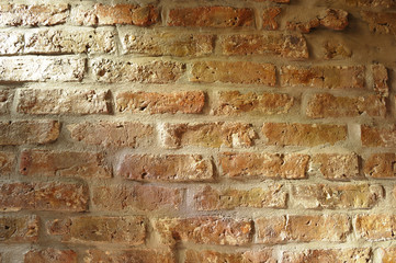 Sunlight on an old brick wall