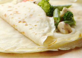 Thin pancakes filled with vegetables