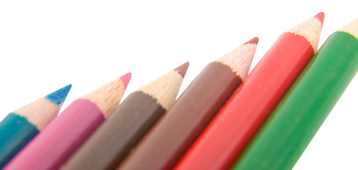 crayon pencil isolated in white focus on one of the pencil