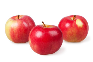 Three red apples isolated on the white