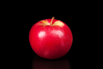 red apple isolated on  black