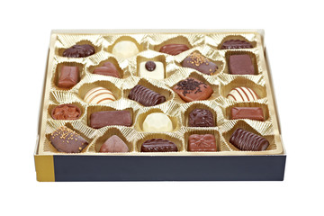 Chocolate candies in a gold box