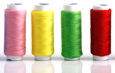 Set of colorful spools of thread