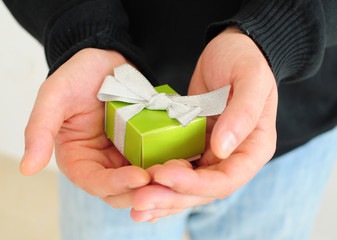 Man holding small present
