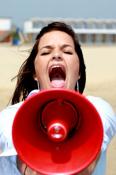 Young Woman Using Megaphone. Model Released