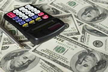 Fototapeta premium calculator and dollars