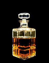 A crystal decanter with whiskey