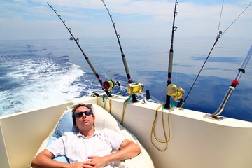 Naklejka premium Sailor man fishing resting in boat summer vacation