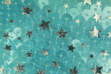 silver and blue fish scale and stars fabric texture © severija