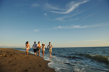 people group running on the beach