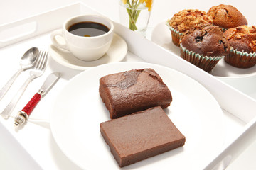 Chocolate brownies in a breakfast setting