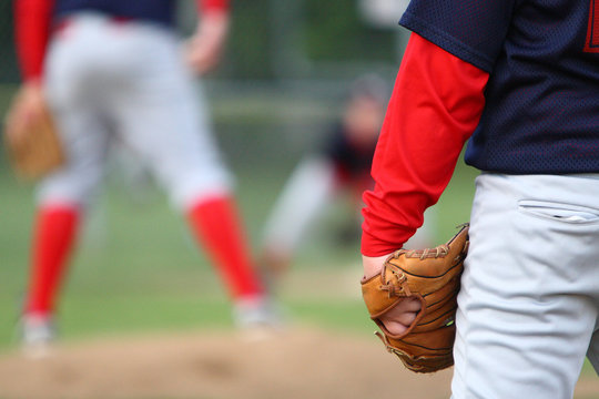 First Baseman And Pitcher On The Mound