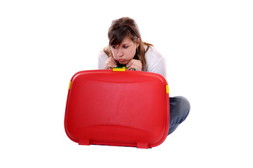 Travel concept young bored woman with suitcase