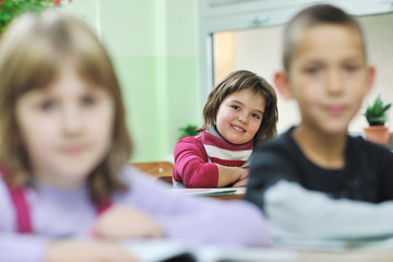 Fototapeta premium happy child in schoold have fun and learning leassos