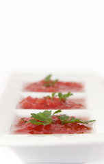 Ground tomatoes served with fresh parsley