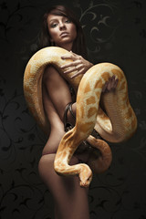 Beautiful woman holding Python (standing)