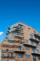 residential building construction site on a lovely summer day (c