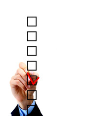 Hand choosing one of three options