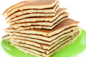 Pancakes on a plate isolated on white