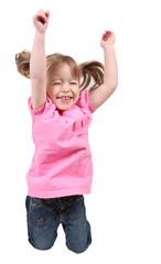 Adorable little girl jumping in air.