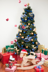 Christmas tree and rain of gifts