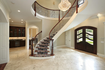 Foyer with curved staircase