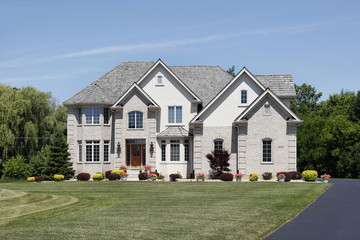 Large home with cedar roof