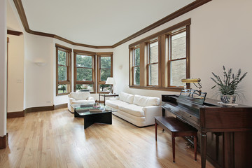 Living room with wood trimmed windows