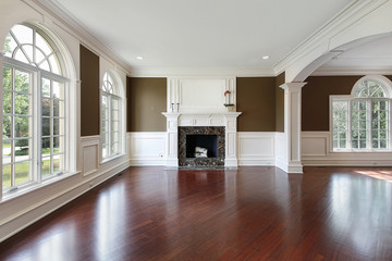 Living room with cherry wood flooring