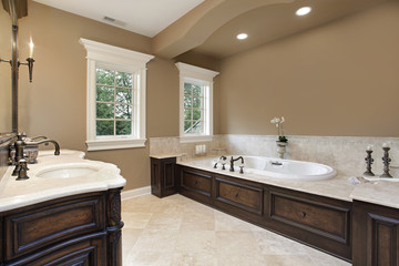 Master bath with dark wood trim