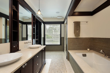 Master bath with dark wood trim