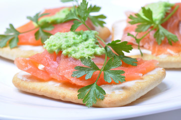 smoked salmon with wasabi  on cracker isolated