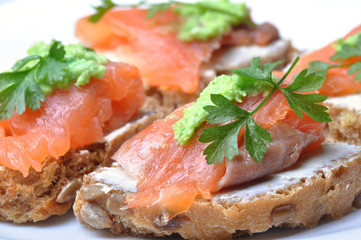Sandwich with smoked salmon isolated