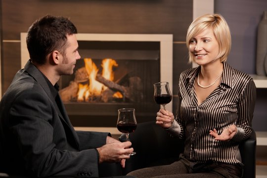 Elegant couple drinking wine