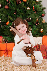 Little girl playing at Christmas