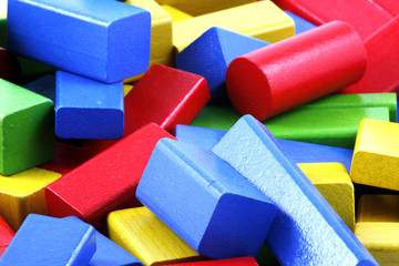 Wooden building blocks on white background