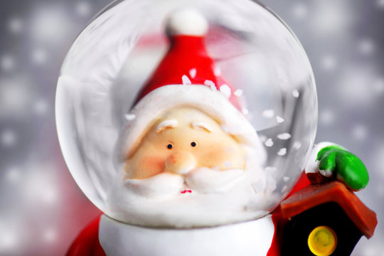 Santa Claus In The Snow Globe