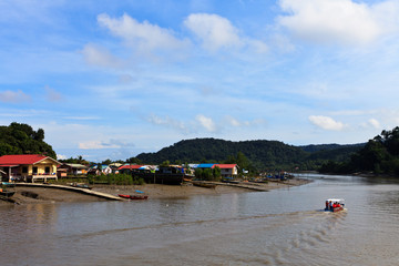 Fototapeta na wymiar Village in Asia near the river