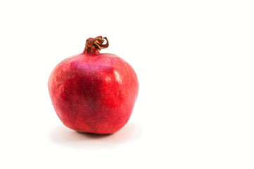ripe pomegranate over white