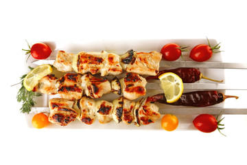 roasted pork kebab on white