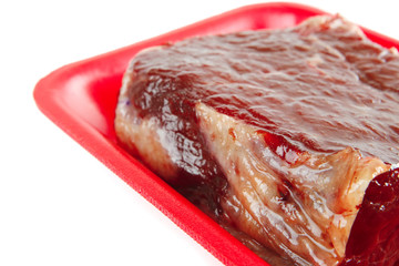 raw meat on tray
