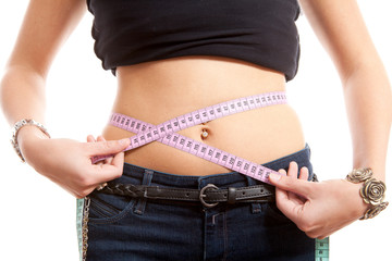 measring waist over white background