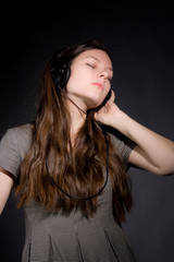 girl in headphones listening music