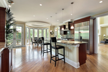 Kitchen with curved eating area