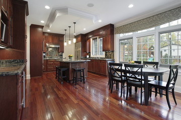 Kitchen with cherry wood flooring