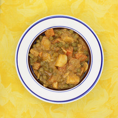 Mixed vegetable in curry sauce in bowl