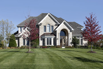 Luxury home with arched entry