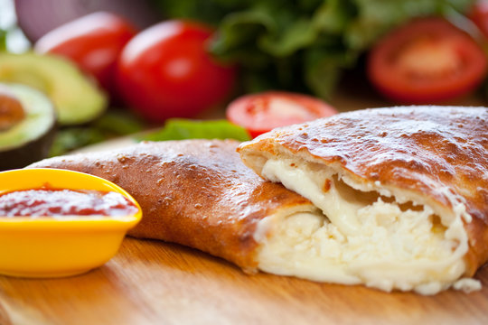 Calzone Cheese Close Up 2